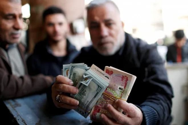 الورقة بـ153 ألف دينار عراقي.. أسعار الصرف بالسوق العراقية